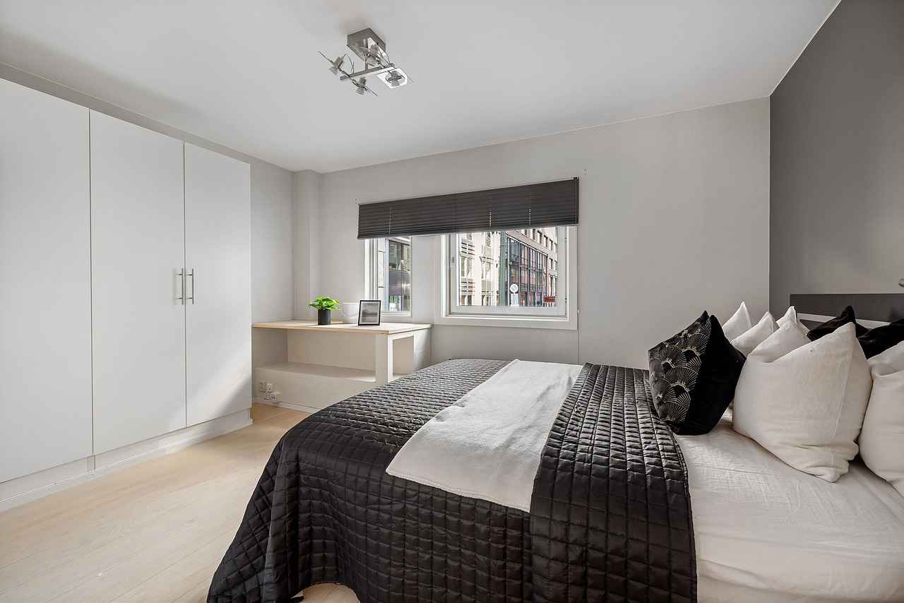 Bed Back Wall Design: Enhance Your Bedroom Aesthetics with Style 5 Incorporating Artwork and Decor